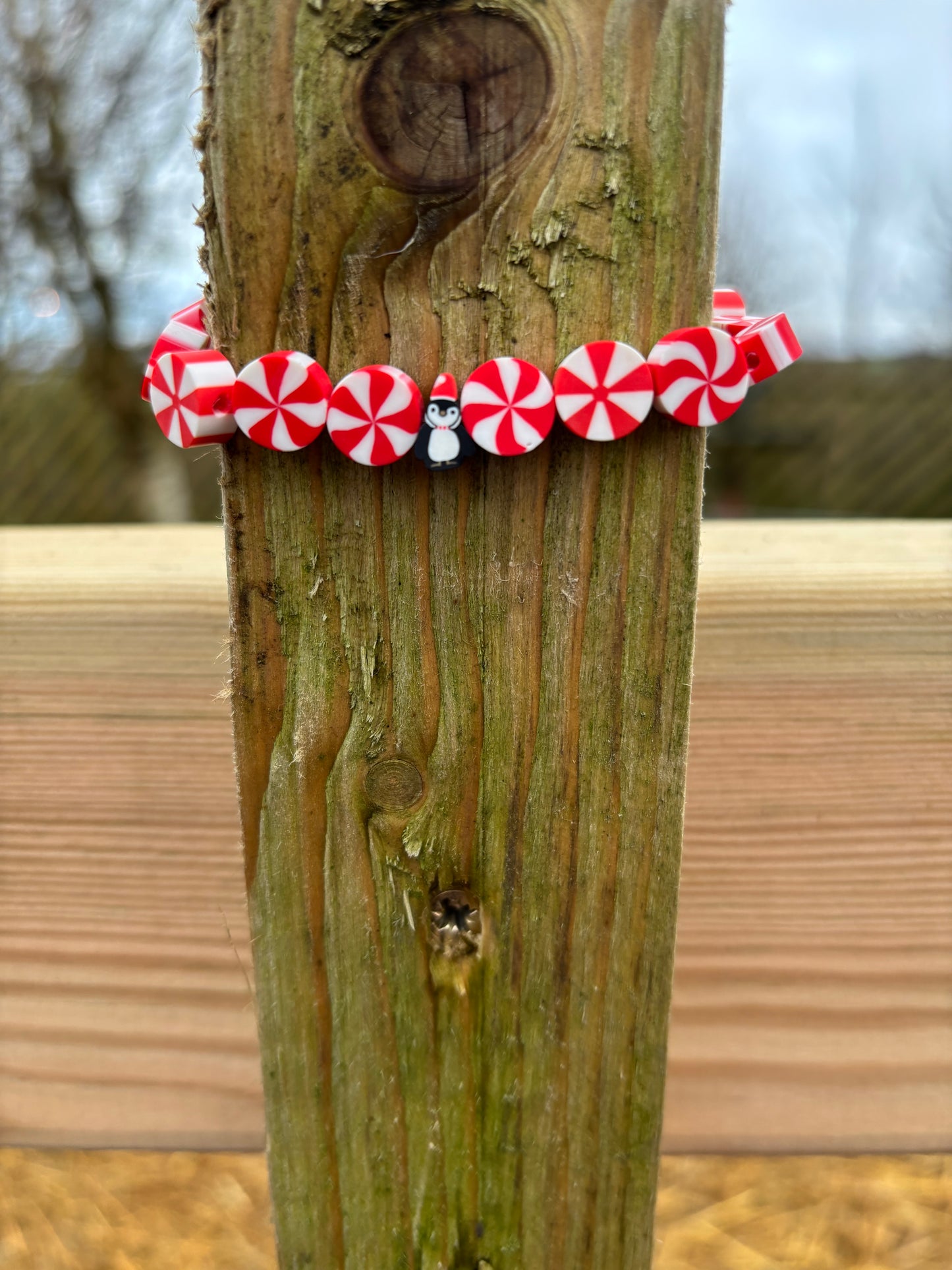 Red peppermint penguin Christmas bracelet