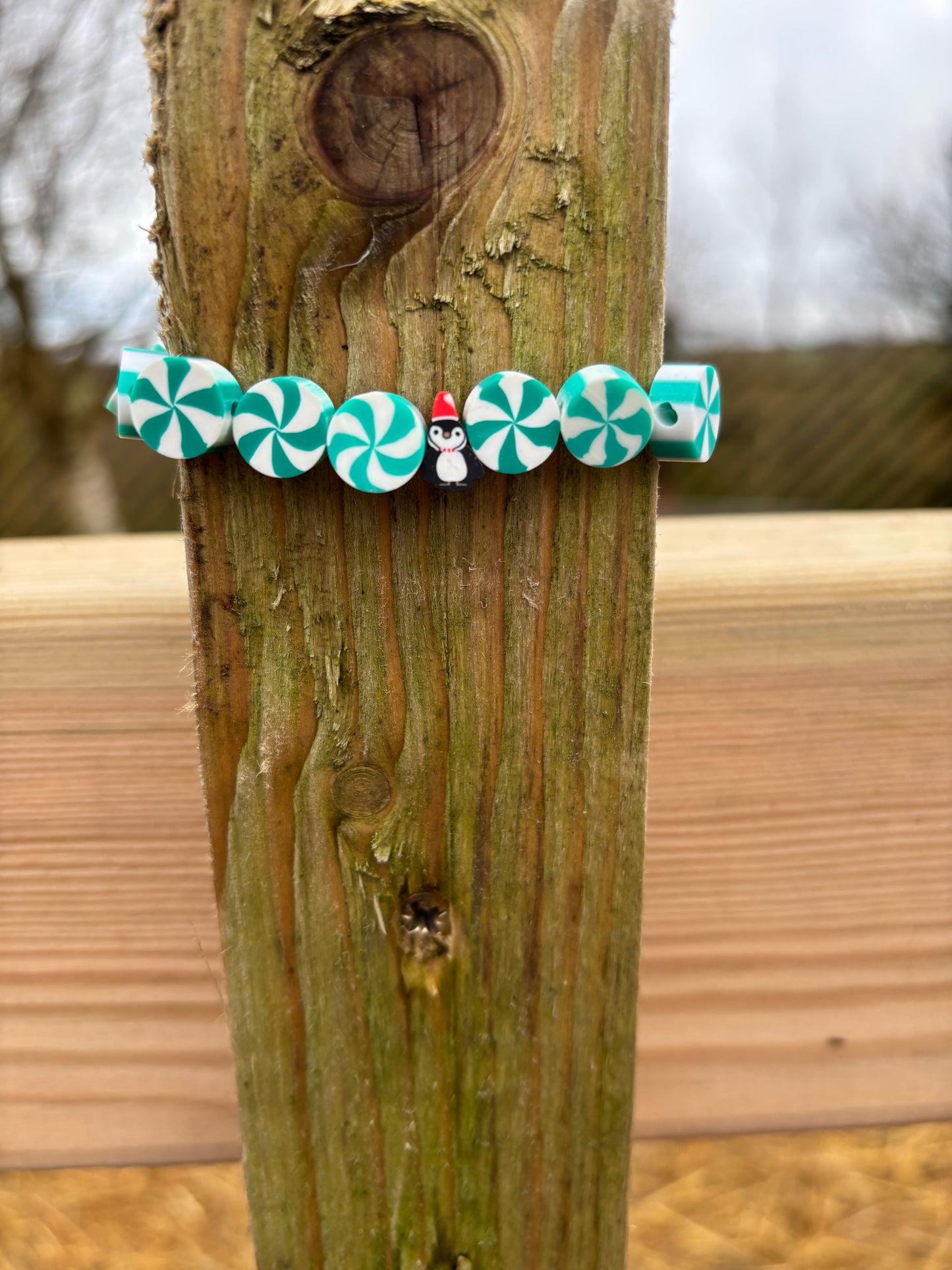 Green peppermint and penguin Christmas bracelets